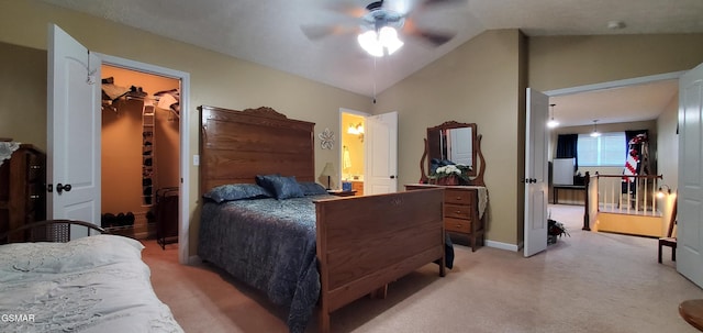 1003 Woullard Way Unit 1, Sevierville, TN 37876 - bedroom featuring light colored carpet, vaulted ceiling, a walk in closet, a ceiling fan, and a closet