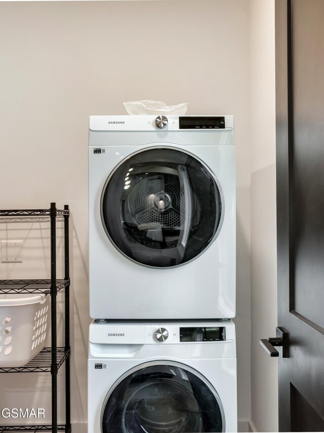 - Chinquapin Drive, Sevierville, TN 37862 - laundry room featuring laundry area and stacked washer / dryer