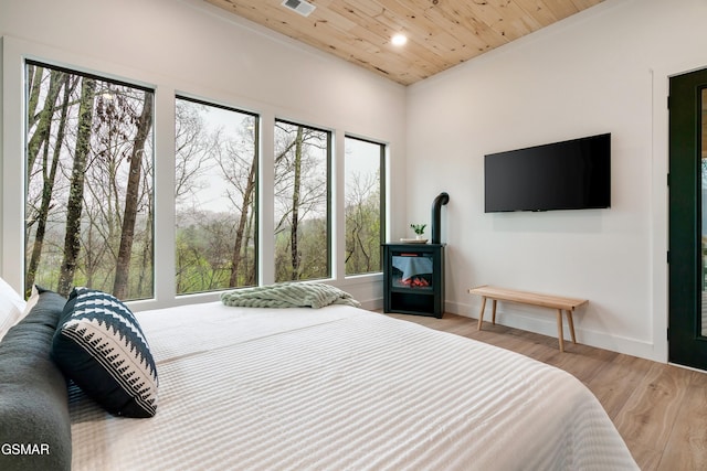 - Chinquapin Drive, Sevierville, TN 37862 - bedroom with wood ceiling, multiple windows, recessed lighting, and wood finished floors