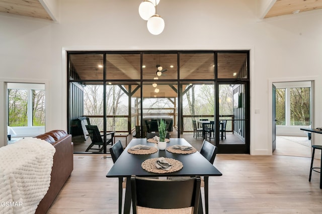 - Chinquapin Drive, Sevierville, TN 37862 - dining room featuring light wood-style flooring and a high ceiling