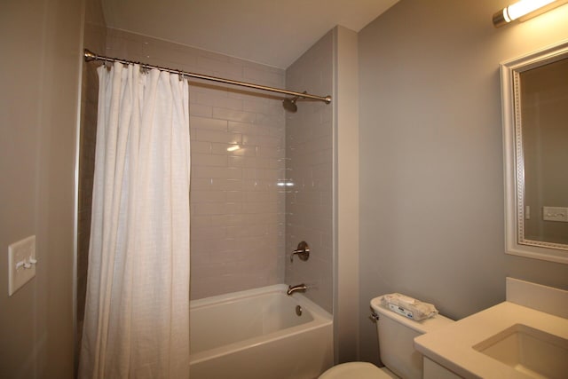 full bathroom featuring toilet, vanity, and shower / tub combo with curtain