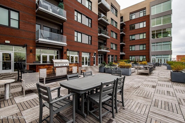 exterior space with exterior kitchen and grilling area