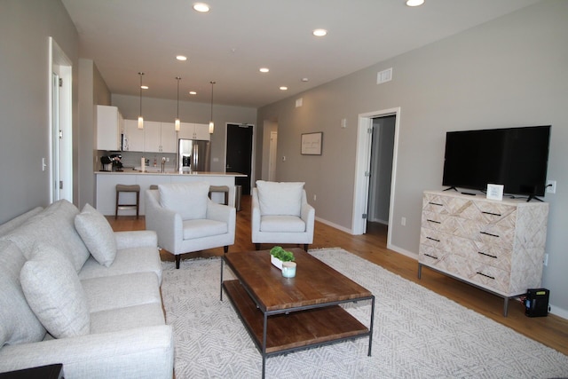 living room featuring light hardwood / wood-style floors