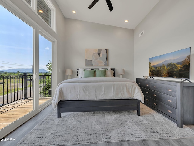 3141 Teaster Ln Unit 2, Pigeon Forge, TN 37863 - bedroom featuring access to exterior, wood finished floors, a ceiling fan, recessed lighting, and a mountain view