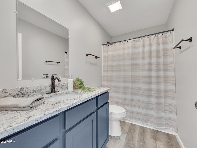 3141 Teaster Ln Unit 2, Pigeon Forge, TN 37863 - full bathroom with vanity and wood finished floors