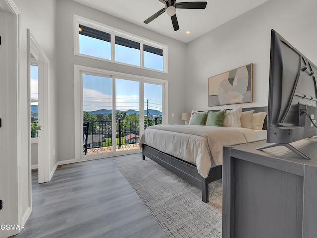 3141 Teaster Ln Unit 2, Pigeon Forge, TN 37863 - bedroom featuring access to outside, wood finished floors, recessed lighting, and ceiling fan