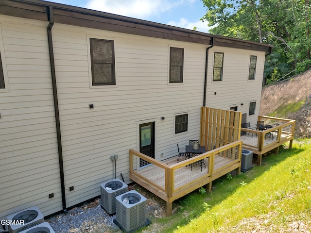 3141 Teaster Ln Unit 2, Pigeon Forge, TN 37863 - rear view of house featuring a wooden deck and a lawn