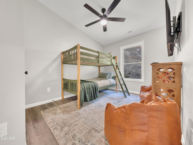 3141 Teaster Ln Unit 2, Pigeon Forge, TN 37863 - bedroom featuring wood finished floors, vaulted ceiling, and a ceiling fan