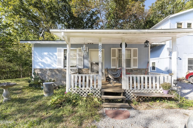 entrance to property with a porch