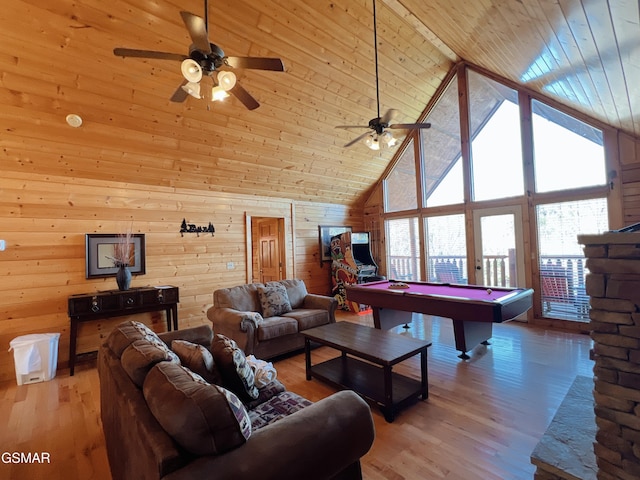 living room featuring ceiling fan, high vaulted ceiling, wooden walls, billiards, and wood ceiling
