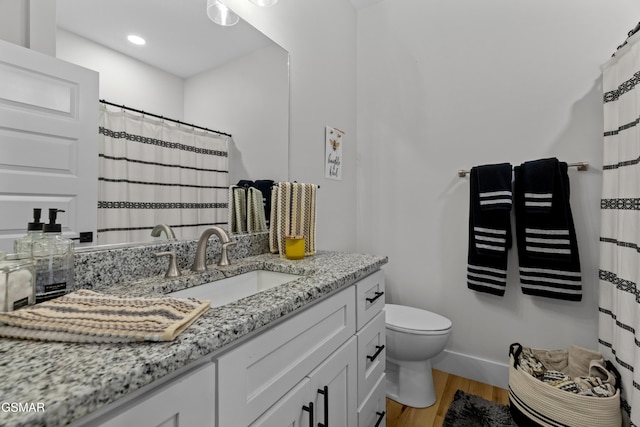 1032 Patriots Dr, Dandridge, TN 37725 - full bath featuring vanity, wood finished floors, recessed lighting, and a shower with curtain
