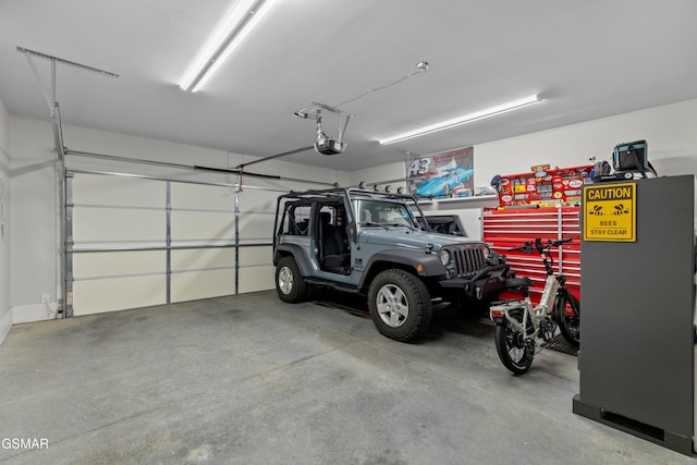 1032 Patriots Dr, Dandridge, TN 37725 - garage with a garage door opener