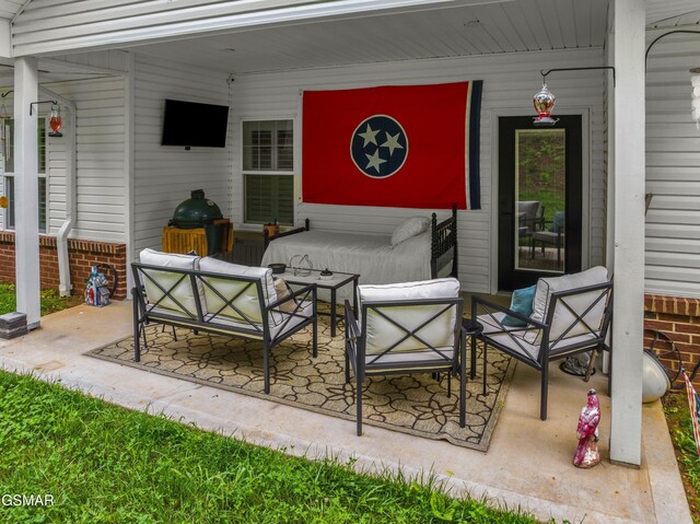 1032 Patriots Dr, Dandridge, TN 37725 - view of patio / terrace with an outdoor hangout area