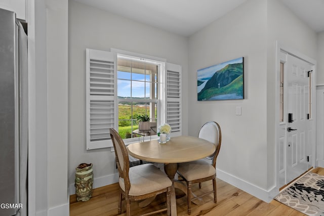1032 Patriots Dr, Dandridge, TN 37725 - dining space with light wood-style flooring