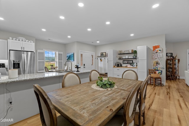 1032 Patriots Dr, Dandridge, TN 37725 - dining area with light wood-style flooring and recessed lighting