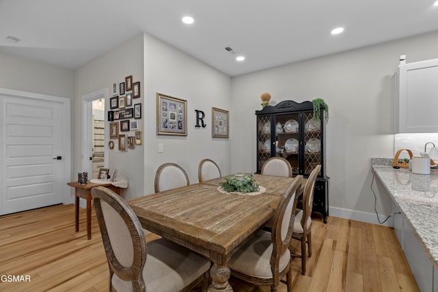 1032 Patriots Dr, Dandridge, TN 37725 - dining area with light wood finished floors and recessed lighting