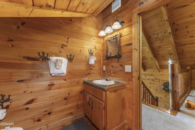 1814 Rhododendron Ln, Sevierville, TN 37876 - bathroom featuring wooden walls, vanity, and wood ceiling