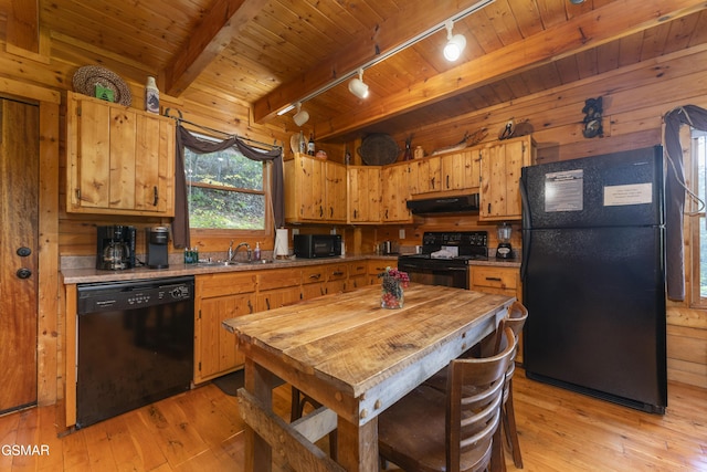 1814 Rhododendron Ln, Sevierville, TN 37876 - kitchen with sink, ventilation hood, track lighting, black appliances, and light wood-type flooring