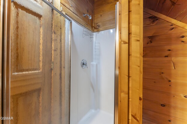 1814 Rhododendron Ln, Sevierville, TN 37876 - bathroom featuring walk in shower and wood walls