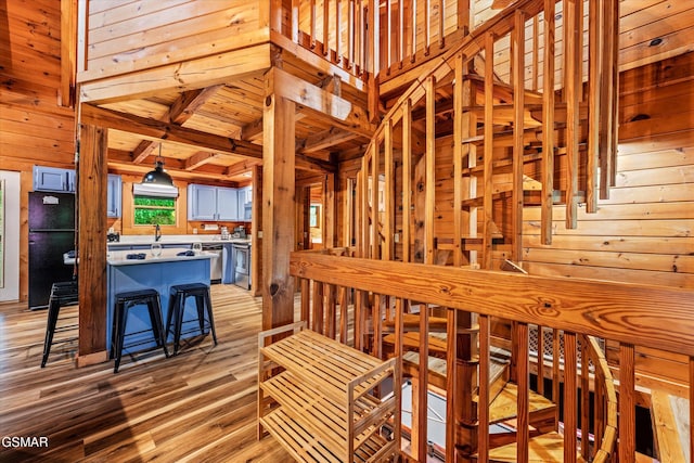 308 Brown Wren Way, Gatlinburg, TN 37738 - interior space featuring wooden walls, wood finished floors, and a wood ceiling with exposed beams