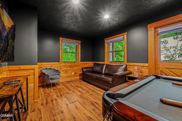 308 Brown Wren Way, Gatlinburg, TN 37738 - rec room with wainscoting, wood finished floors, recessed lighting, healthy amount of natural light, and wood walls