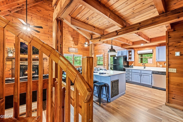 308 Brown Wren Way, Gatlinburg, TN 37738 - kitchen featuring dishwasher, freestanding refrigerator, a ceiling fan, wood walls, and wooden ceiling