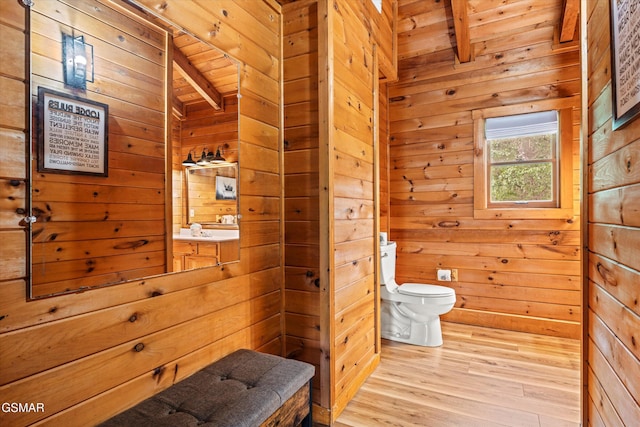 308 Brown Wren Way, Gatlinburg, TN 37738 - half bathroom with wooden walls, wood finished floors, and a wooden ceiling with exposed beams