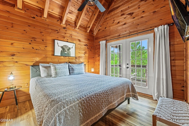 308 Brown Wren Way, Gatlinburg, TN 37738 - bedroom featuring access to exterior, wood finished floors, wooden walls, french doors, and wood ceiling