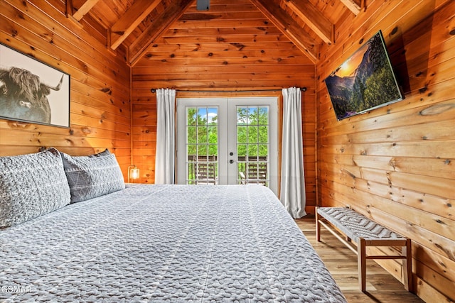 308 Brown Wren Way, Gatlinburg, TN 37738 - bedroom featuring access to outside, wooden ceiling, wooden walls, wood finished floors, and french doors