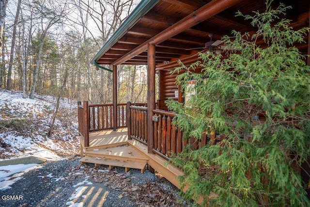 snow covered deck with ceiling fan