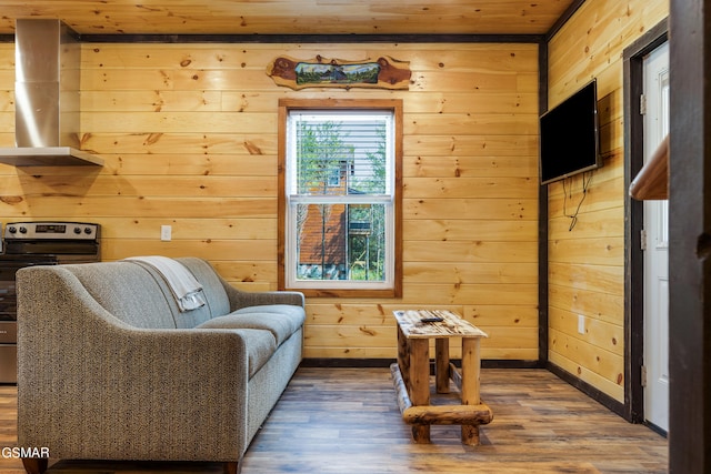 living area featuring wood walls, wood ceiling, and hardwood / wood-style flooring