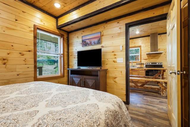 bedroom featuring wood walls, wooden ceiling, and dark wood-type flooring