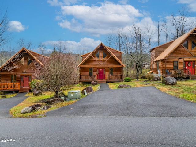 view of log cabin