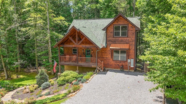 2313 Bogle Spring Loop, Sevierville, TN 37862 - view of front of property featuring covered porch and roof with shingles