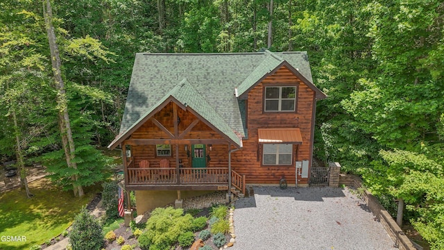 2313 Bogle Spring Loop, Sevierville, TN 37862 - view of front of house with a shingled roof and a view of trees