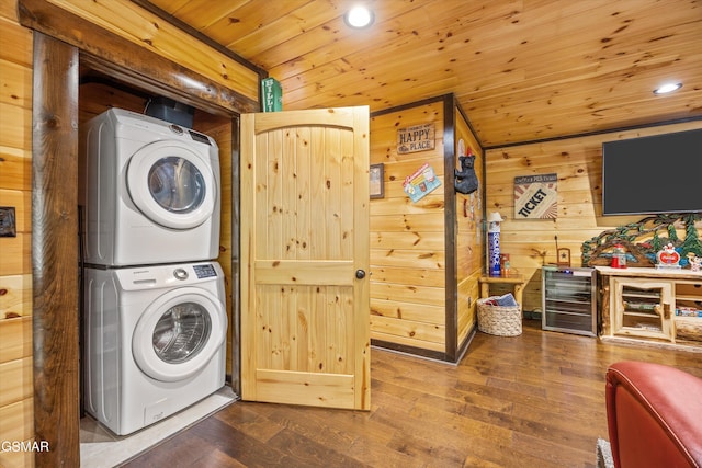 2313 Bogle Spring Loop, Sevierville, TN 37862 - laundry area with stacked washer and clothes dryer, wooden ceiling, beverage cooler, wood finished floors, and wood walls