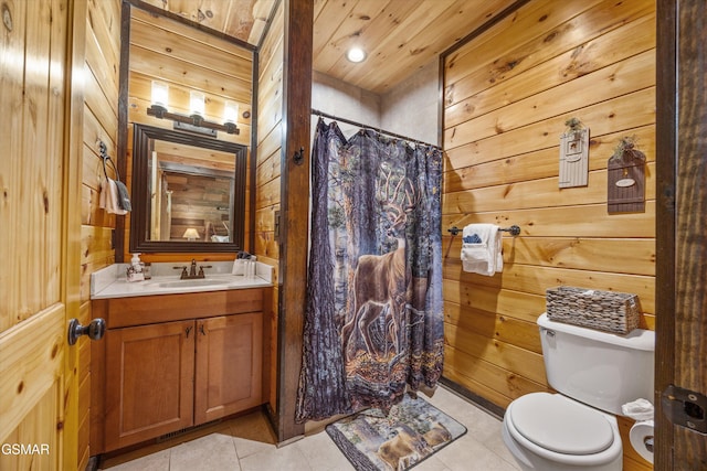 2313 Bogle Spring Loop, Sevierville, TN 37862 - full bath with wood walls, vanity, tile patterned floors, a shower with curtain, and wood ceiling