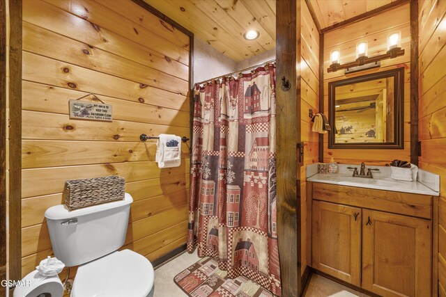 2313 Bogle Spring Loop, Sevierville, TN 37862 - full bath featuring wooden walls, vanity, wood ceiling, and a shower with shower curtain