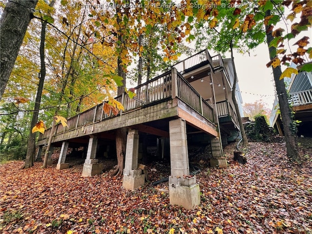 view of side of property with a deck