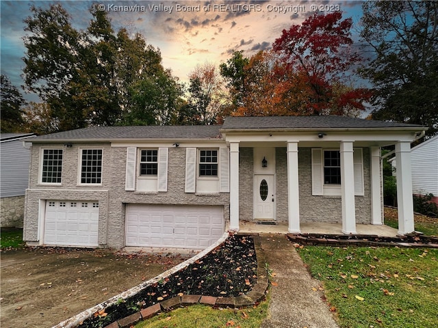 view of front of home with a garage