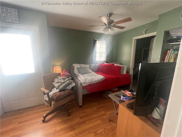 bedroom featuring ceiling fan and light wood-type flooring