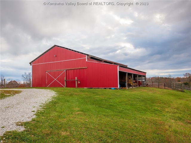 view of shed / structure with a yard