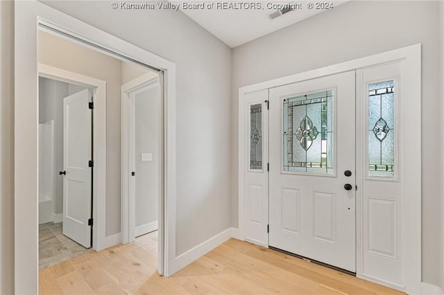 227 Woodland Dr, Milton, WV 25541 - foyer entrance featuring light wood-style floors and baseboards