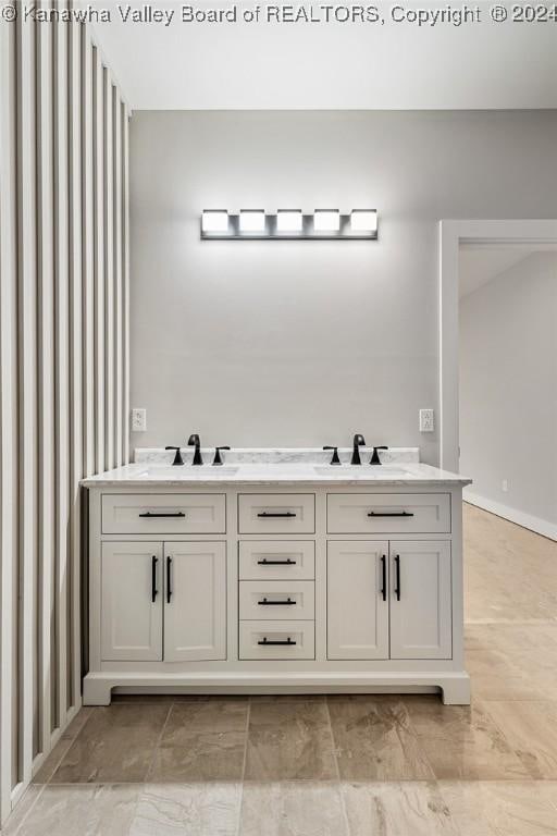 227 Woodland Dr, Milton, WV 25541 - full bathroom featuring a sink, wallpapered walls, and baseboards