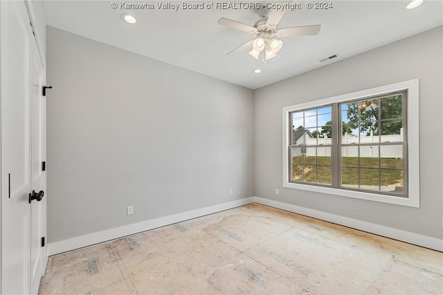 227 Woodland Dr, Milton, WV 25541 - unfurnished room with baseboards, a ceiling fan, and recessed lighting