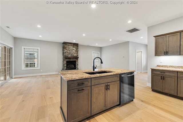 227 Woodland Dr, Milton, WV 25541 - kitchen featuring a sink, dishwasher, light wood-type flooring, baseboards, and recessed lighting