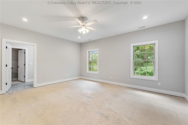 227 Woodland Dr, Milton, WV 25541 - unfurnished bedroom with multiple windows, baseboards, recessed lighting, and ceiling fan