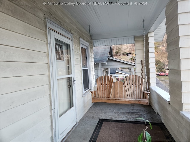 exterior space featuring covered porch