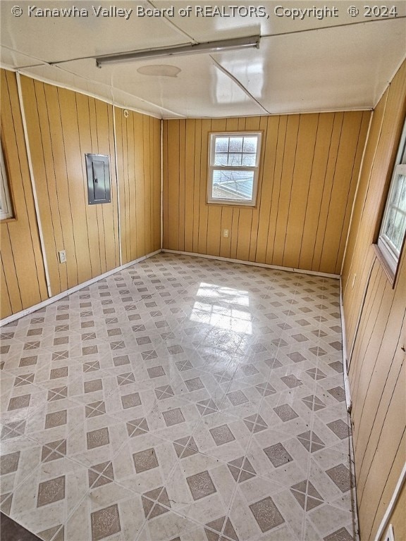 tiled empty room with wooden walls