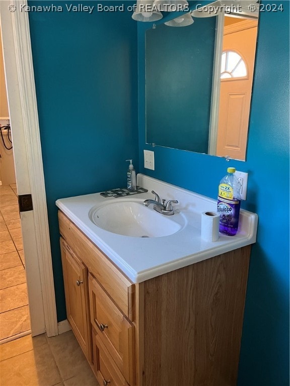 bathroom with tile flooring and oversized vanity